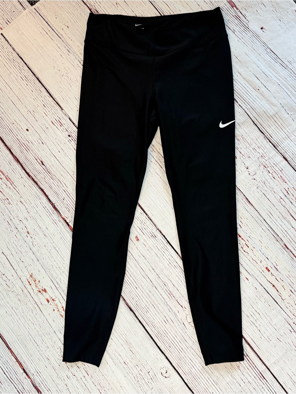 Nike Kids Black Athletic Leggings with White Swoosh